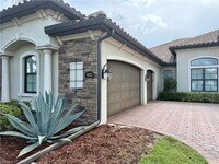 Building Photo - 9923 Corso Bello Dr