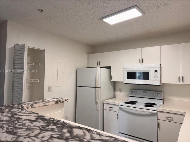 Building Photo - 4440 NW 107th Ave