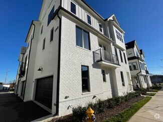 Building Photo - NOW pre-leasing! Carson Condominiums