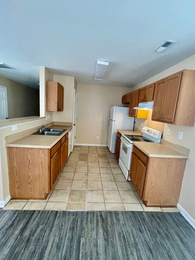 Building Photo - Welcome to this beautiful 4-bedroom, 2.5-b...