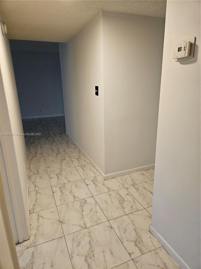 Building Photo - 11131 Royal Palm Blvd