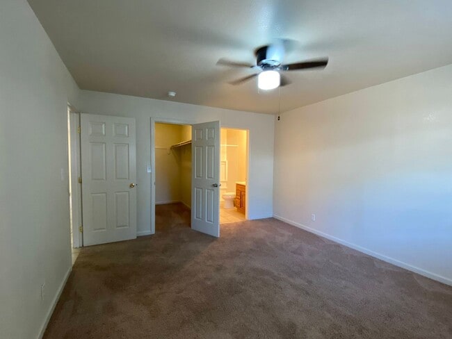 Building Photo - Spacious Duplex with Two Bedrooms, Two Bathrooms and Two Car Garage