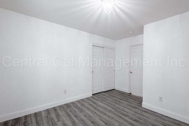 Building Photo - 3 Bedroom/2 Bath with a Pool and Solar - $...