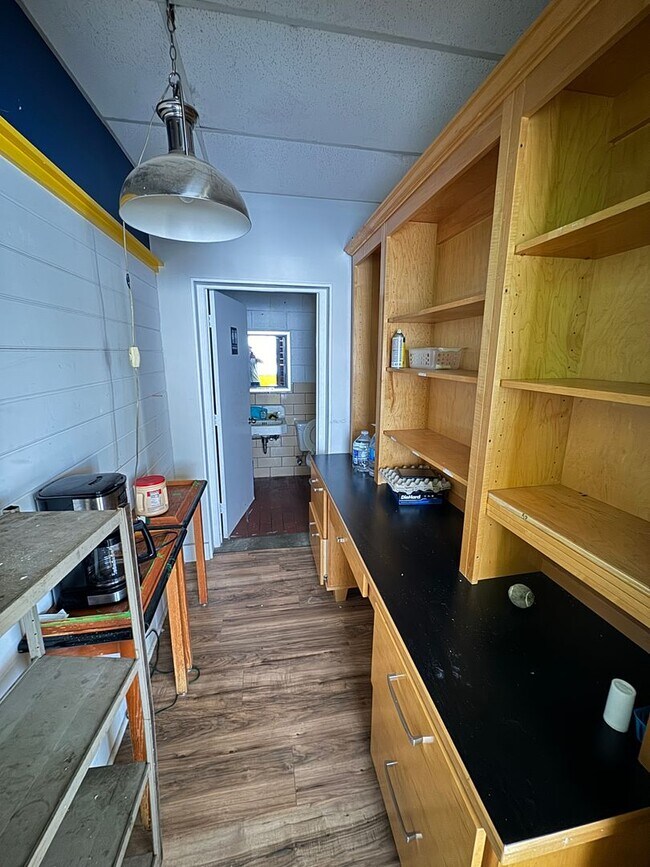 Building Photo - Prime Commercial Space for Rent in Downtown Granite Quarry - 1,323 Sq Ft with Bay Doors