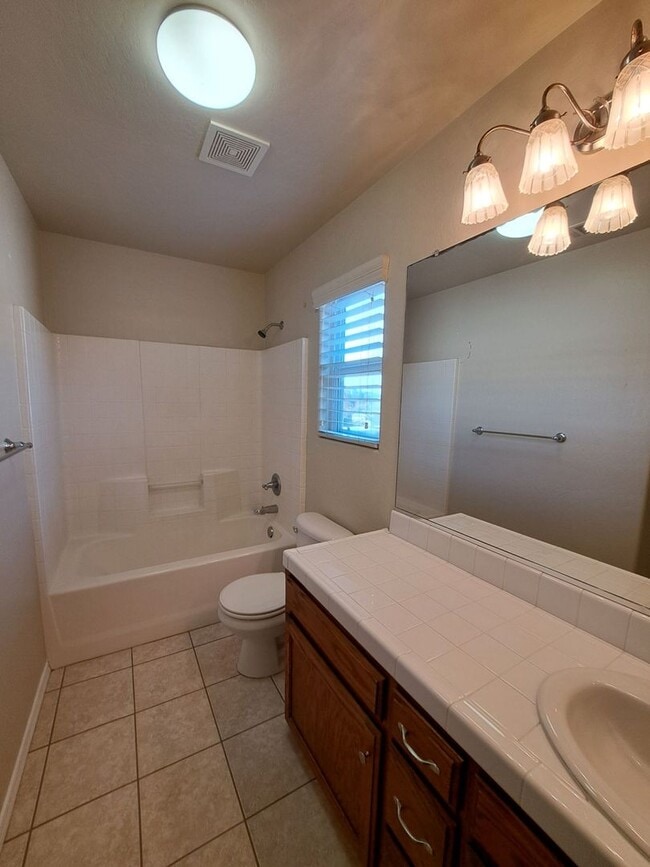 Building Photo - Spacious 2-Story Fresno Home with Bonus Room!