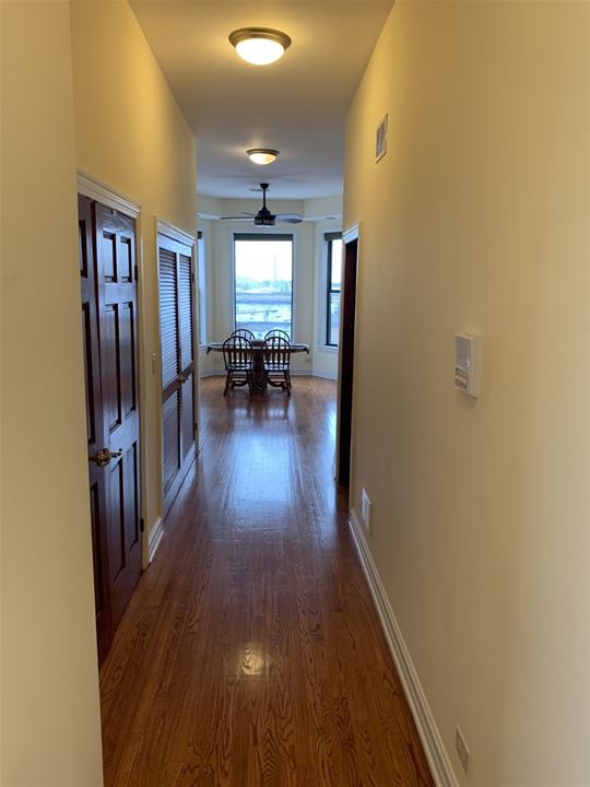 Hallway to kitchen (laundry/storage in closet)) - 2658 W Washington Blvd