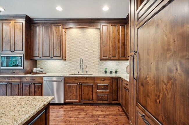 Building Photo - 2 Creeks Condominiums - Gated Community on...