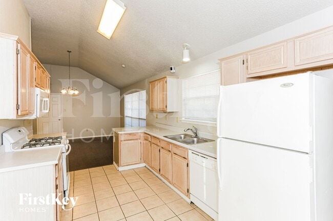 Building Photo - 5309 Tennis Villa Dr