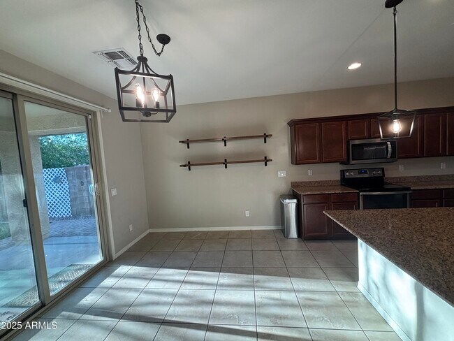 Building Photo - 8778 N 89th Dr