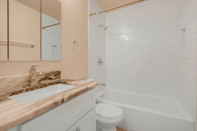 Building Photo - Spacious 4 BR/2.5 BA Single-Family Home in...