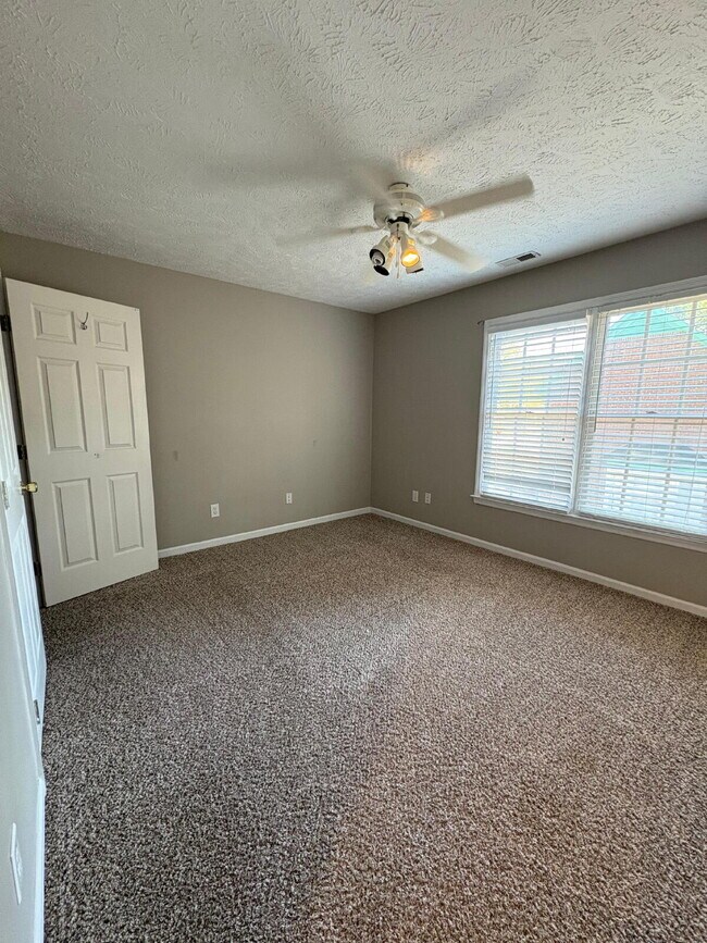 Building Photo - Beautiful executive home, in desirable neighborhood close to schools and Fort Bragg