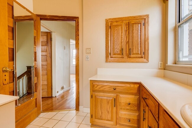 Building Photo - AVAILABLE June 2026 - Beautiful 4 Bedroom, 2 Bath Home w/ Front Porch Swing!