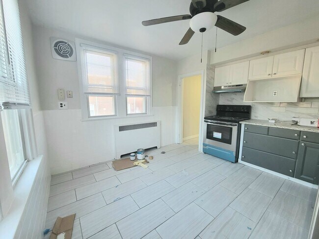 Building Photo - Stunning 4-Bedroom Townhome with Finished ...