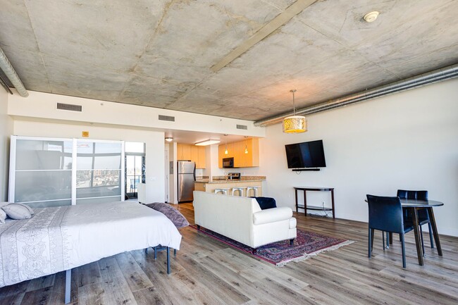 Building Photo - Stunning 16th-Floor Smart Corner Loft with...