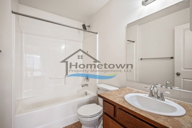 Building Photo - Townhouse Style Home with 3 Bedrooms, 2.5 Bathrooms, and a 2-Car Attached Garage Available in Coe...