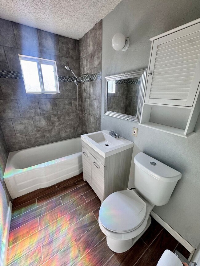 Building Photo - Charming 3-bedroom, 1-bath home featuring an attached carport and a fully fenced backyard—perfect...