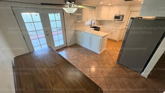 Building Photo - 3 bedroom 2 bathroom home on a corner lot with extra fenced parking.