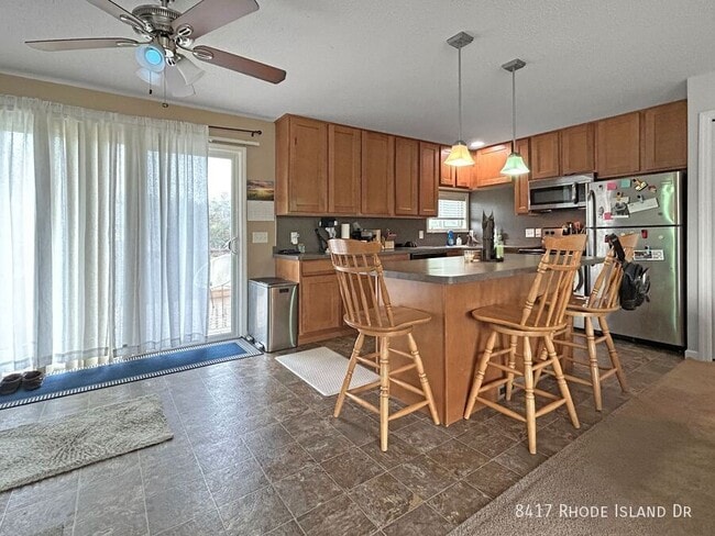 Building Photo - 8417 Rhode Island Dr N