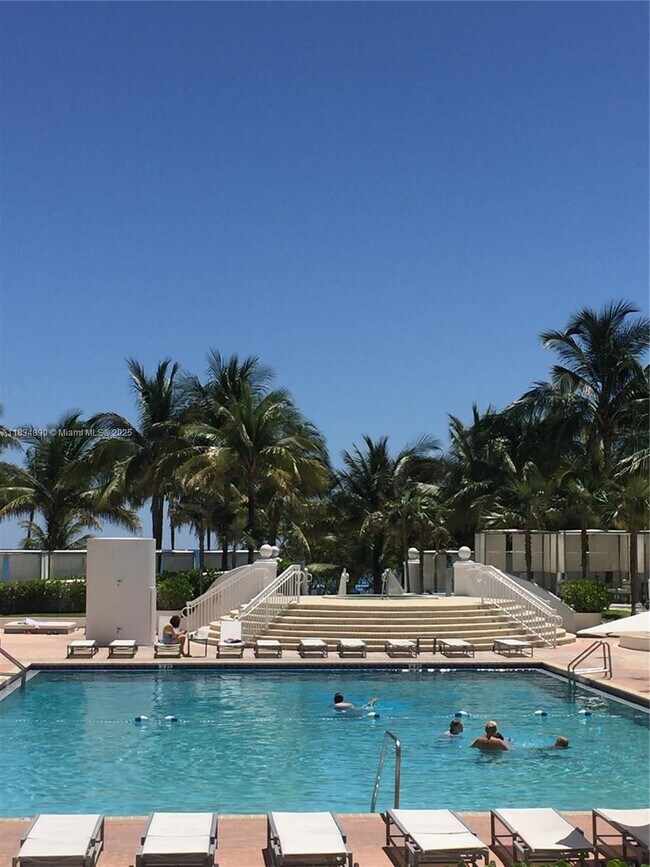Building Photo - 10275 Collins Ave