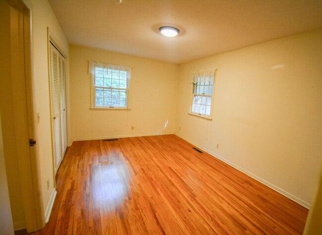 Building Photo - 4 Bed, 2 Bath Home for Rent – Unique Design & Retro Charm