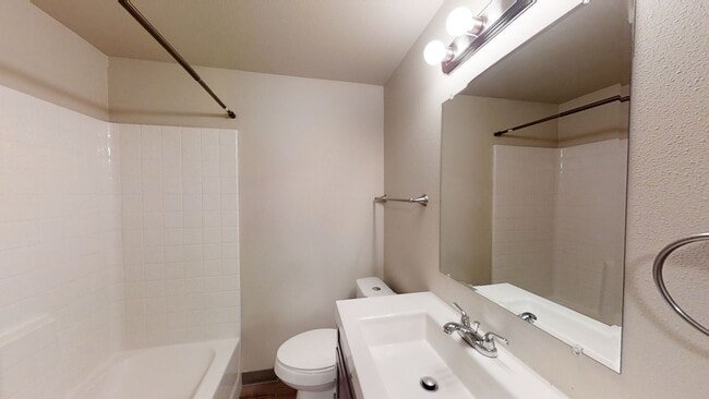 Building Photo - Charming 2 Bedroom Duplex - Granite Counters, Plank Flooring, Fully Fenced, Storage Shed!