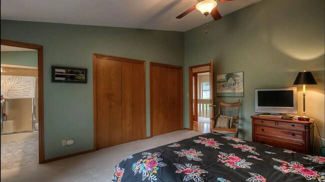 Building Photo - 4bd/3ba HUGE Home w/Hardwood Floors, Russian Fireplace, 2-Car Garage & Fenced Back Yard!