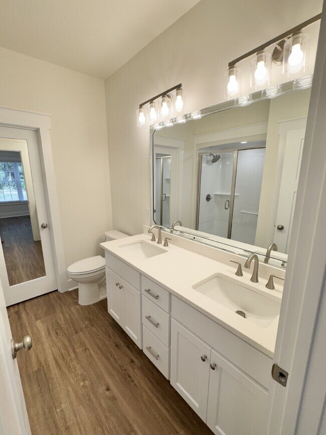 Building Photo - Low Maintenance Lifestyle! GORGEOUS 2 BR | 2 BA Brick Duplex in Rosewood (Goldsboro) *Lawn Care/T...
