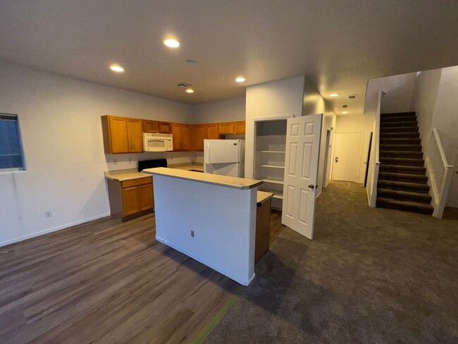 Building Photo - Fresh Paint/New Flooring all inside! Four ...
