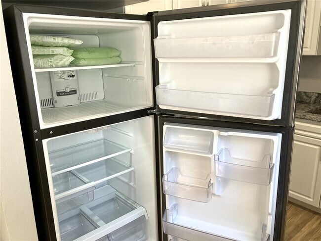 Building Photo - 11703 Raintree Village Blvd