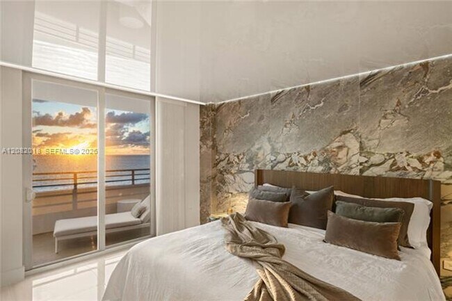 Building Photo - 5555 Collins Ave