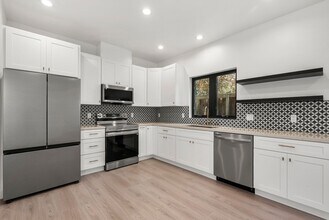 Building Photo - Stunning brand new construction, modern lu...