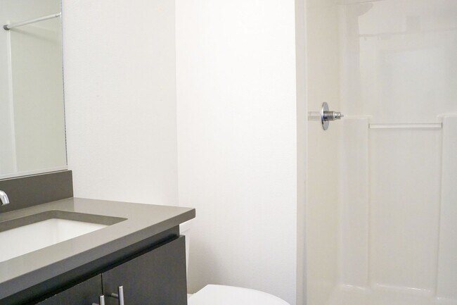 Building Photo - Modern & Sleek One-Bedroom Townhouse Ready...