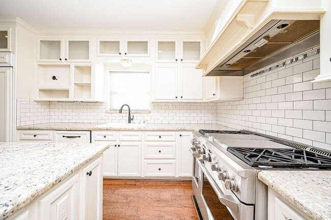 Building Photo - Discover this stunning one-story corner lo...