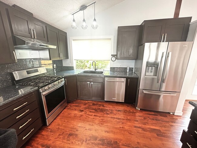 Building Photo - Spacious West Hill Gem – 4 Bed, 3 Bath wit...
