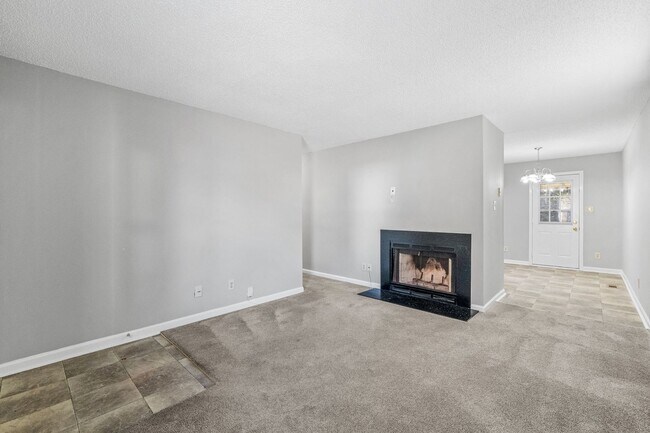 Building Photo - NE Home - Updated Kitchen and Bathrooms!  SS Appliances, Fire Place, Front Porch & Deck, Fenced Y...