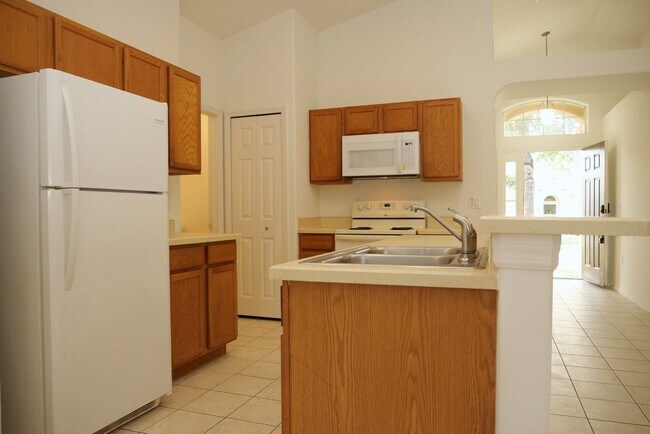 Building Photo - 4 Bedroom Pool Home Available Now!