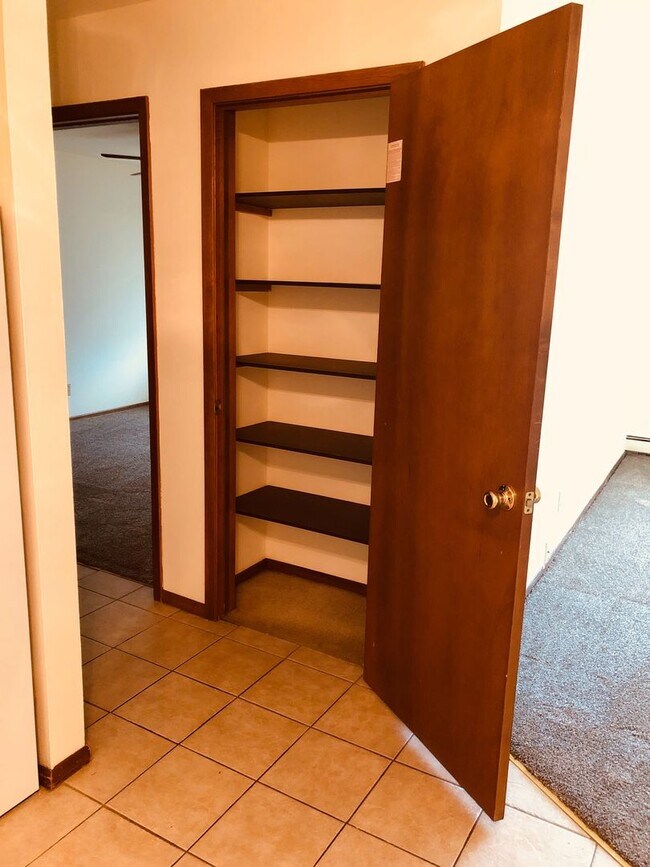 Building Photo - Spruce Court Apartment - Greenfield WI - Call 262-420-0390 to schedule a showing