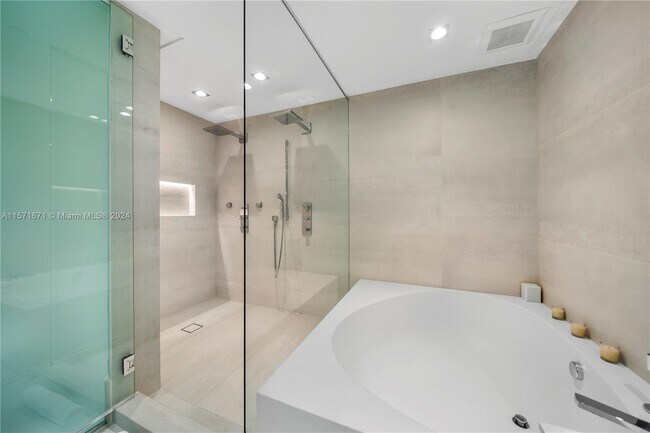 Building Photo - 10203 Collins Ave