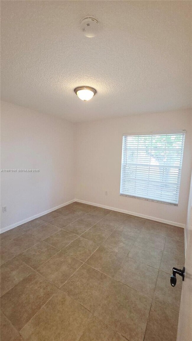 Building Photo - 3247 NW 123rd Ave