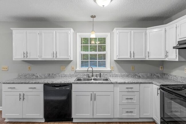 Building Photo - NW Home - Updated Kitchen and Bathrooms, Wood Laminate Flooring, Deck, Must See!