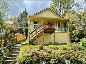 Building Photo - Remodeled Beauty in Woods Setting with Riv...