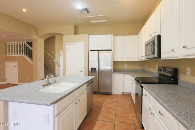 Building Photo - 7456 W Aurora Dr