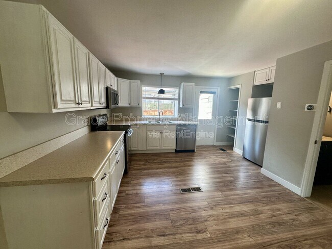 Building Photo - 9616 W Chatfield Ave