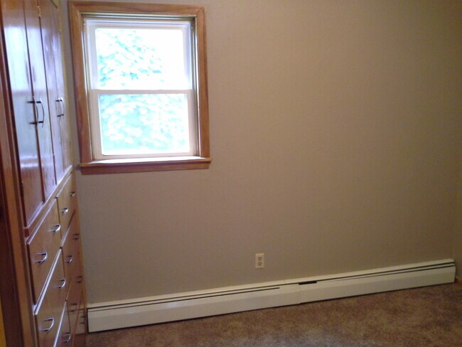 Bedroom with Built In Dressers and Closet - 205 2nd St W