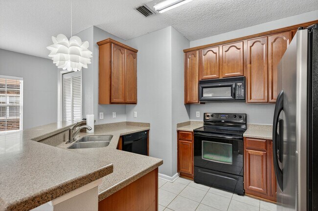 Building Photo - Cable TV and Internet Included!