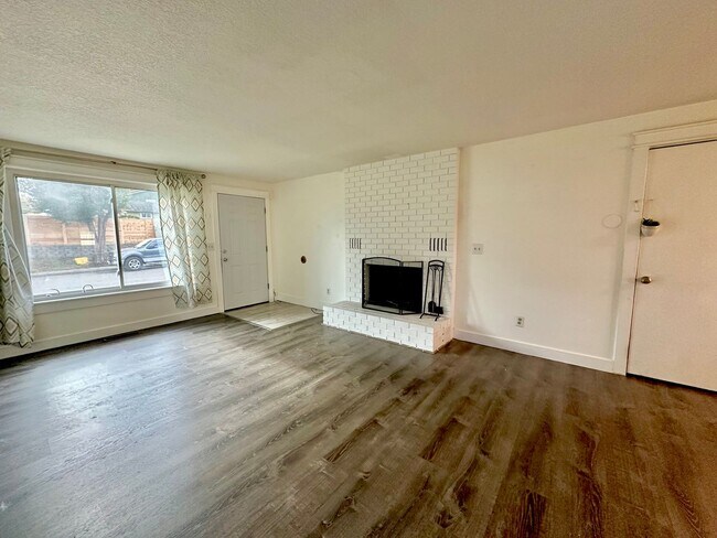 Building Photo - Three bedroom home with large fenced yard