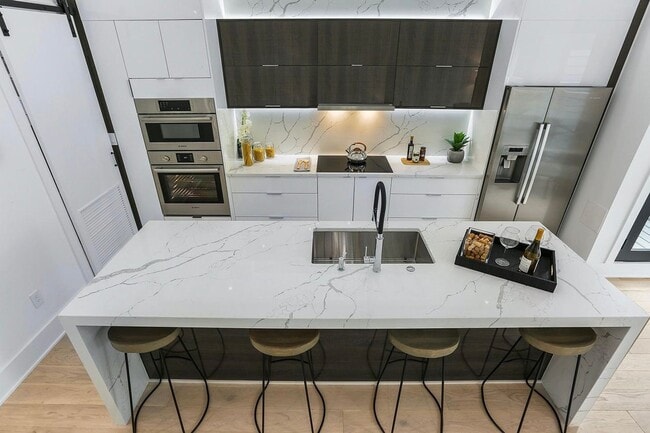 Building Photo - Private Double Decker Rooftop! - Modern Lu...