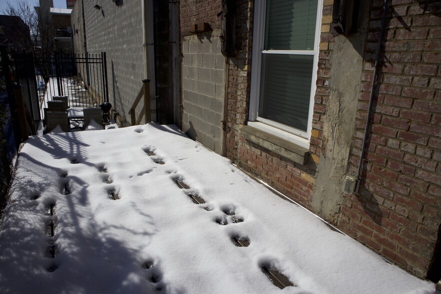 Outdoor deck/patio area, perfect for lounging or grilling - 244 Peters St SW