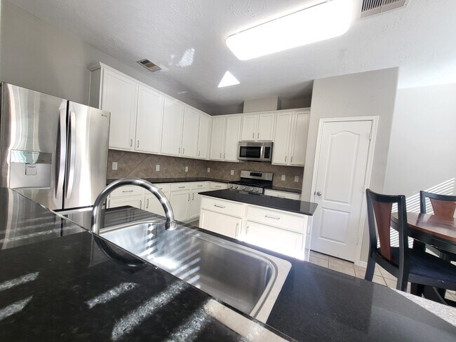 Building Photo - 7415 Hollister Ridge