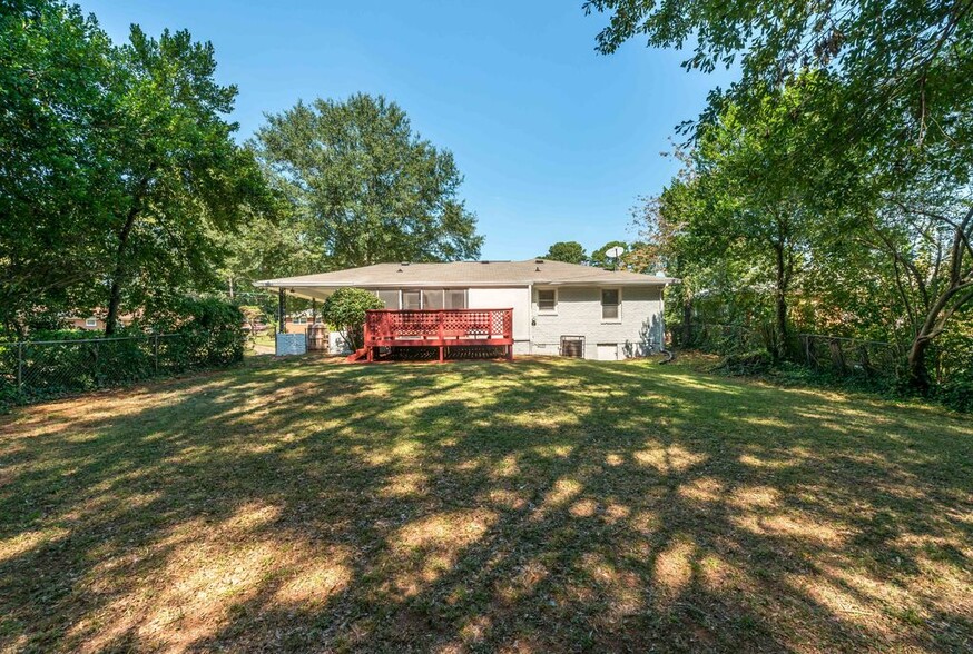 back deck and screened porch to be replaced with an open porch Summer or Fall 2025 - 2461 Fontaine Circle